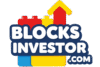 The logo for "BLOCKS INVESTOR.COM" is displayed. The word "BLOCKS" is in large white, bold, sans-serif letters on a dark blue background, with "INVESTOR" beneath it in slightly smaller white letters. Above the text, three block-like shapes are visible: a red one resembling a house or roof on the right, a yellow one in the center, and a blue one on the left, reminiscent of building bricks. The ".COM" is in small white letters on a light blue or yellow bar at the bottom. The entire logo has a slight upward curve, suggesting growth.